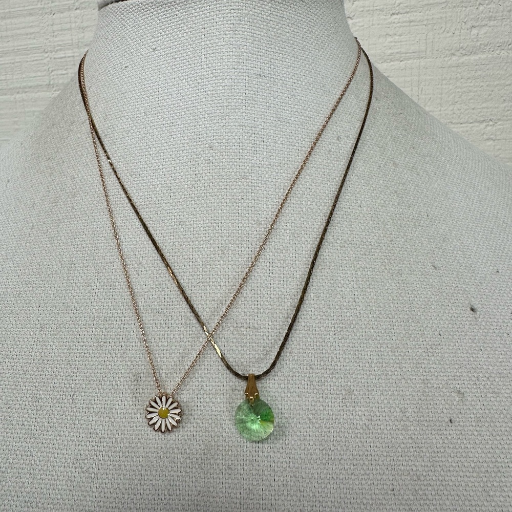 Two dainty goldtone daisy and green stone necklace